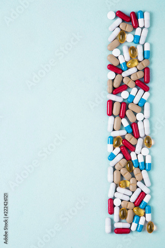 Pharmaceutical preparations  background. Colorful medications Pills  tablets and capsules are scattered. Medical concept