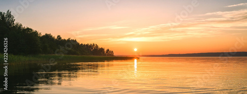 Background sunset panorama on the lake