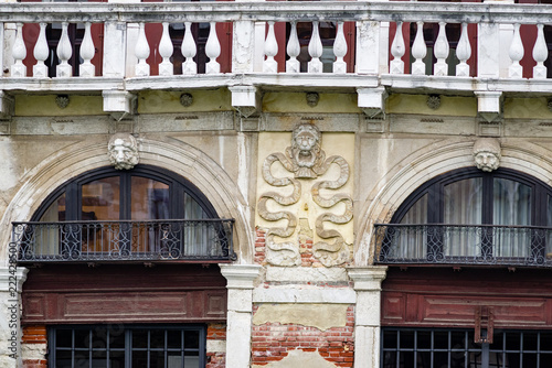 Exterior details of palazzos & buildings in Venice, Italy as seen from the Grand Canal. photo