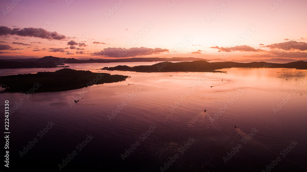 siargao islands sunset purple sea ships