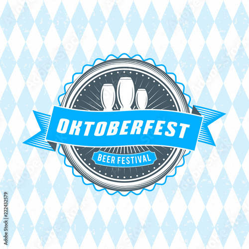 Beer festival Oktoberfest celebrations. Vintage beer badge on the traditional Bavarian linen flag background