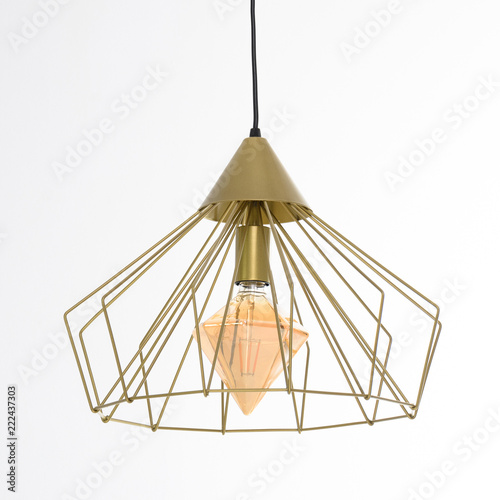 Luminaire with a non-ordinary lamp gold © Євген Вознюк