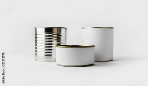 Three food tin cans with blank white labels. Responsive design mockup.