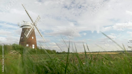 English Windmill; with pull focus onto foreground grass