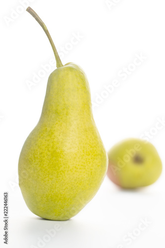 yellow ripe pear on white background