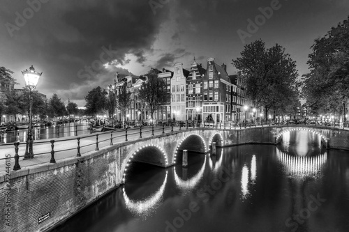 Beautiful view of the famous UNESCO world heritage canals of Amsterdam, the Netherlands, in black and white. Keizersgracht (Emperors canal) photo