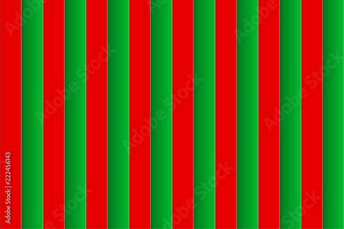 Cardboard textured background of gradient red and green colored stripes, Christmas theme, paper-cut style. Vector illustration, EPS10. Use as background, backdrop, wallpaper, montage, template, etc.