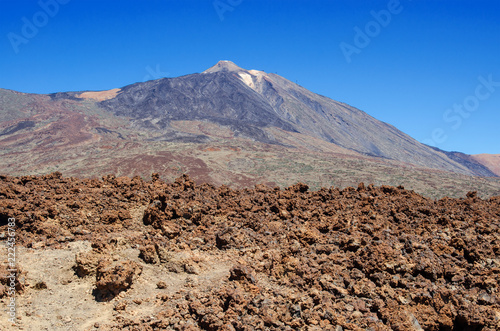 Landscape with Mount Teide. Hardened lava in the foreground. Teide National Park, Tenerife, Canary Islands, Spain. 