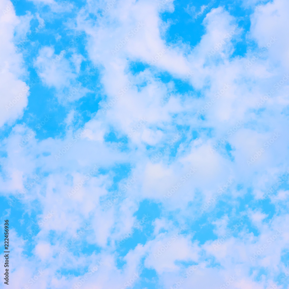 Light blue spring sky with clouds