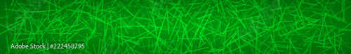 Abstract horizontal banner or background of intersecting lines in green colors.