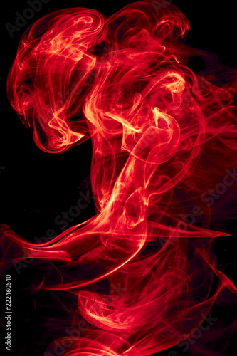 Red smoke on black background