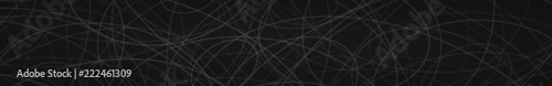 Abstract horizontal banner of randomly arranged contours of ellipses on black background