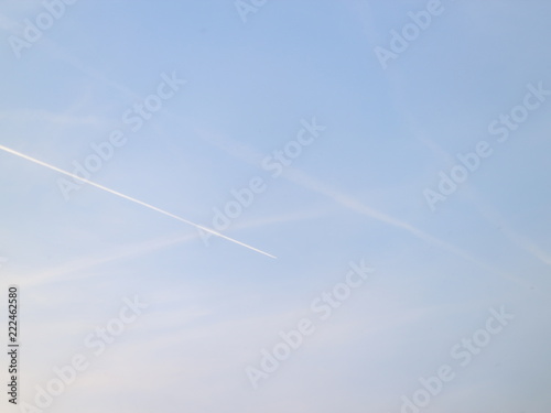 airplane trail in the blue sky