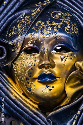 The traditional beautiful Venetian mask for participation in the carnival is shot close-up. 