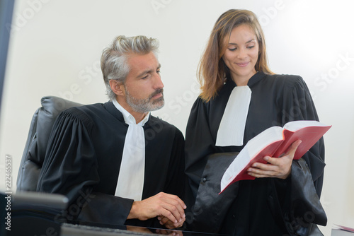 judges reading law book