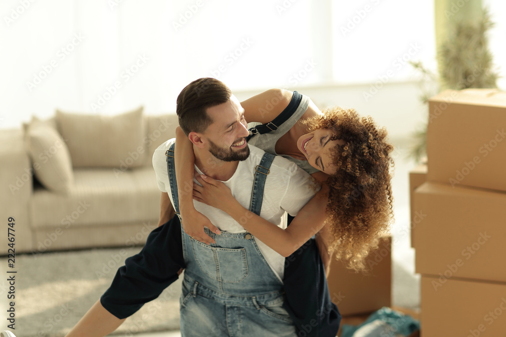 Wife and husband are happy to move to a new home. Wife and husband are happy to move to a new home.