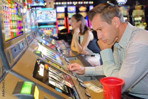 playing on the slot machines photo