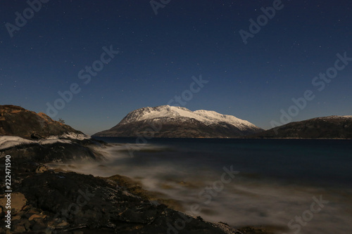 The moon shines on Andalshatten with snow on top  Northern Norway © Gunnar E Nilsen