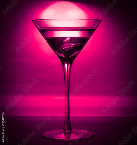 a glass of martini. close-up. in club