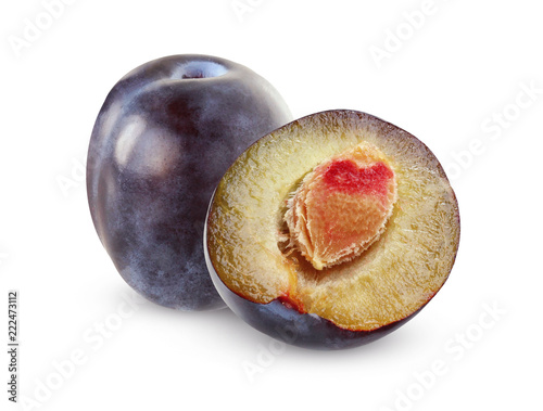 Isolated plums. One whole fruit and one half.