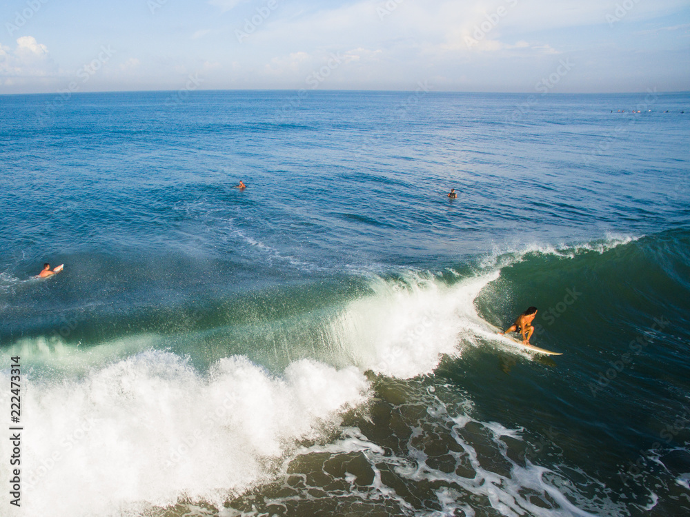 left hander glassy offshore rivermouth canggu indonesia bali spray