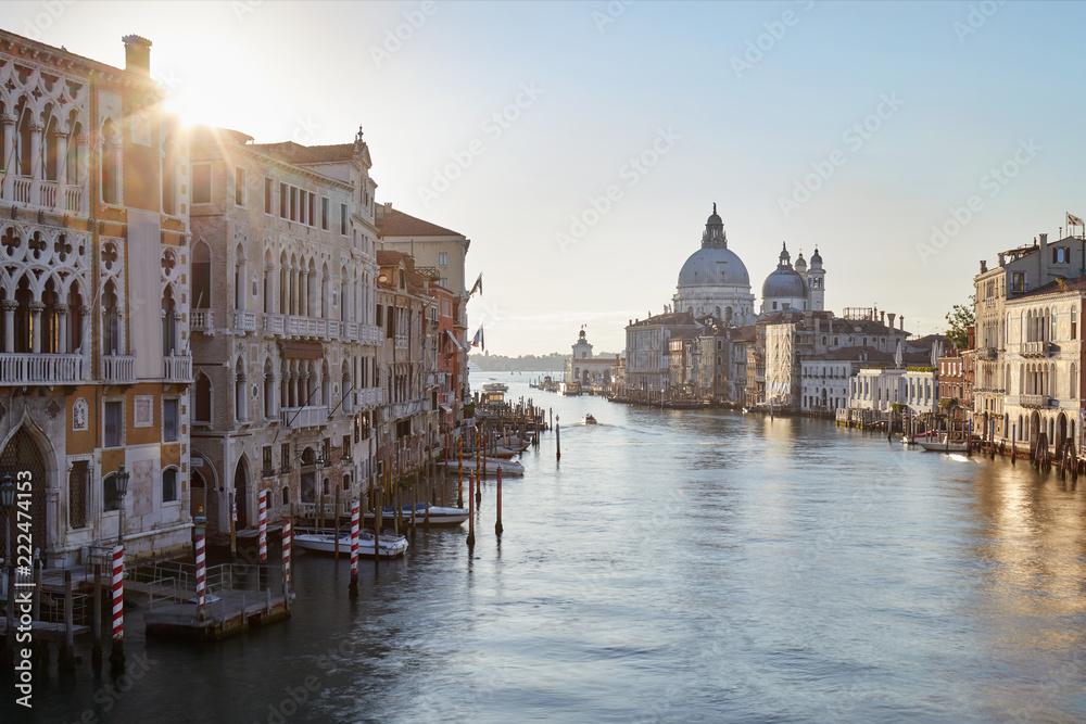 Grand Canal in Venice with Saint Mary of Health basilica, sun in the morning in Italy
