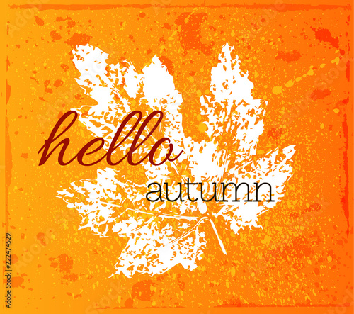 Colorful grunge banner with the imprint of a leaf and an inscription Hello autumn. Vector card on the autumn theme. Lettering.