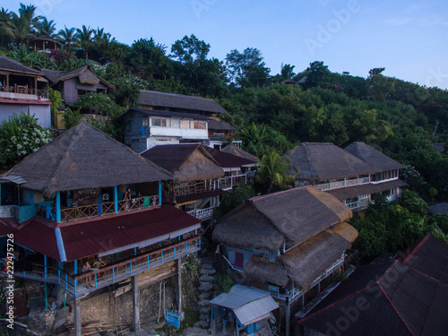 bingin terrace houses vertical view epic ocean scenic trees photo