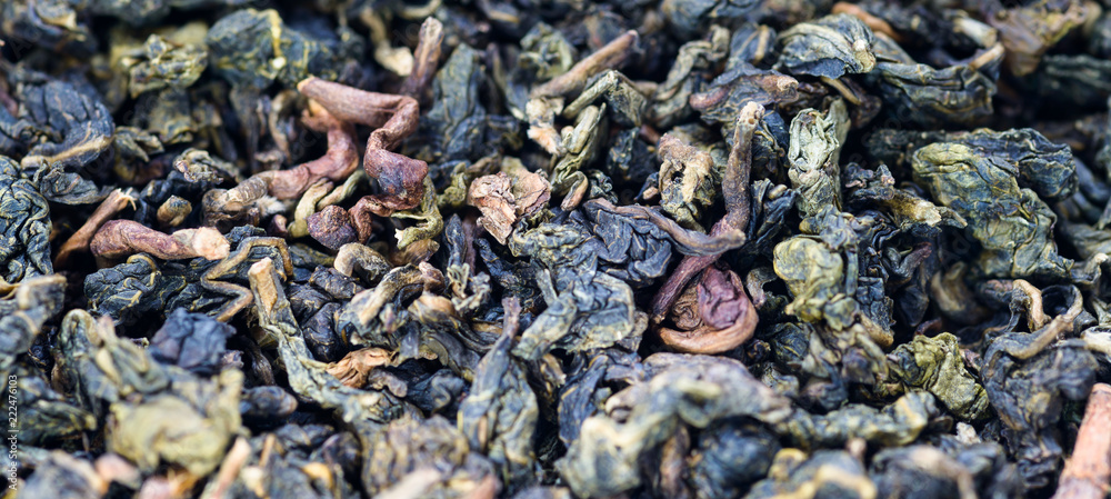Leaves of green tea - food background. Macro with shallow depth of field. Leaves of green tea - food background. Macro with shallow depth of field.