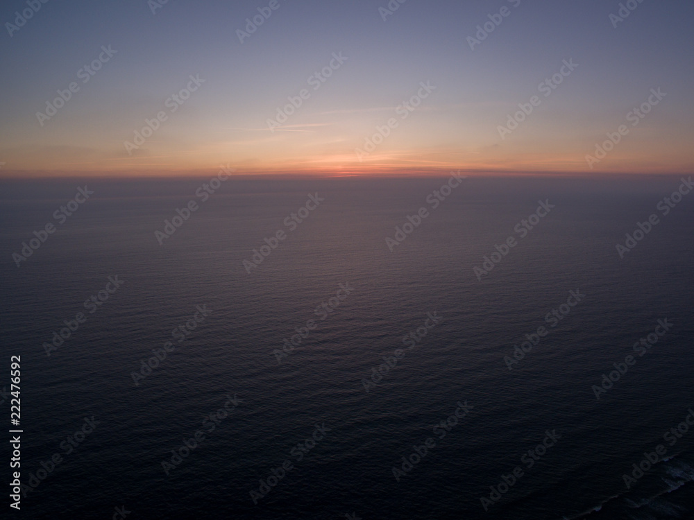 Obraz premium sunset cap ferret france horizon blue atlantic ocean aerial drone shot