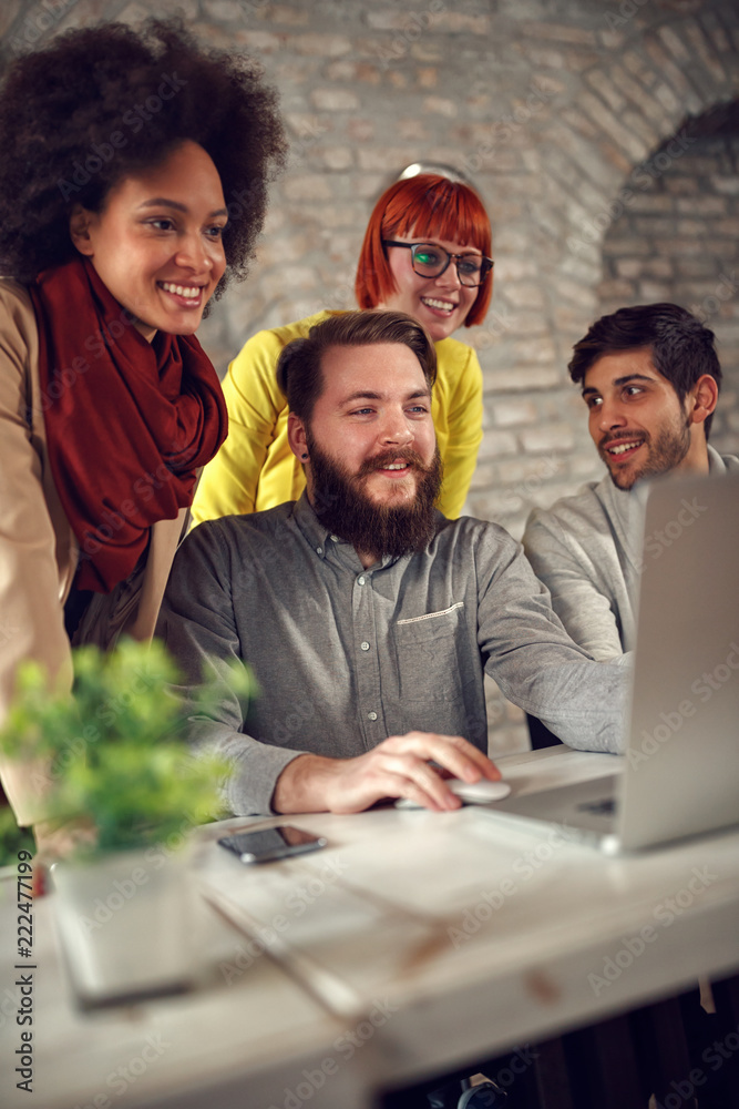 Fototapeta premium smiling web designers brainstorming.