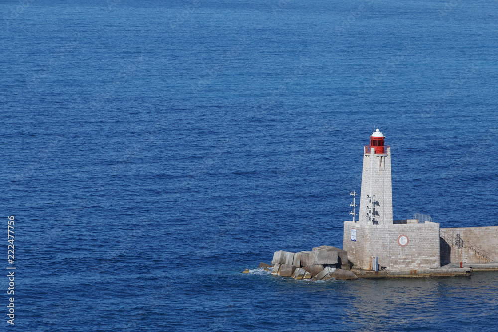 view on azure sea around lighthouse in Nice, France