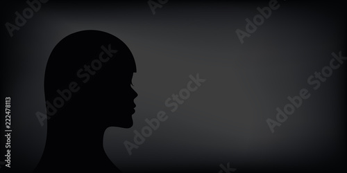 sad depressed woman silhouette on black background
