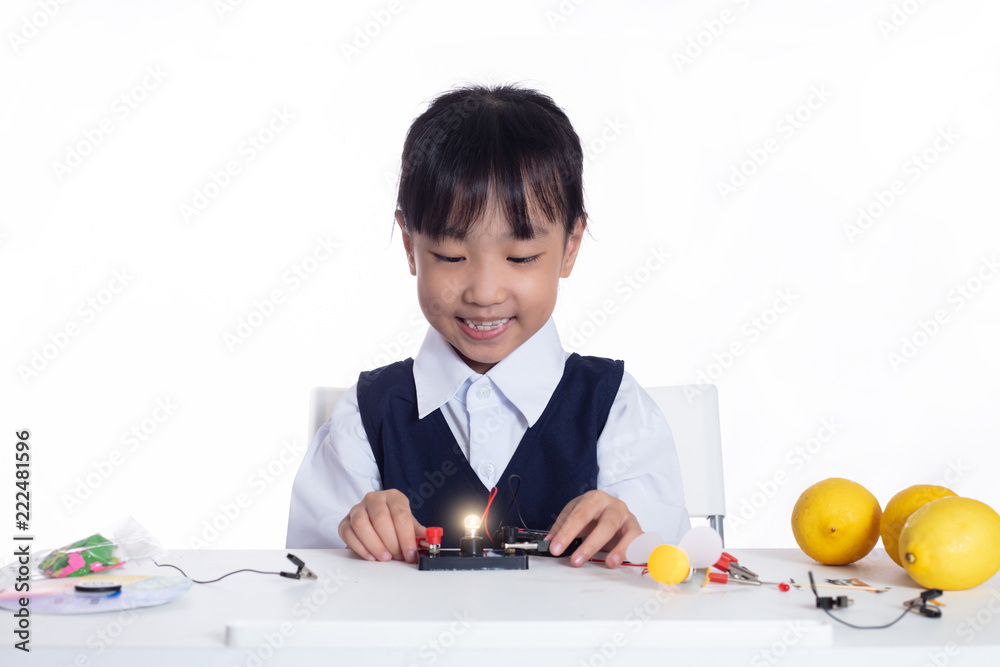 Asian chinese little girl doing experiments Asian chinese little girl doing experiments