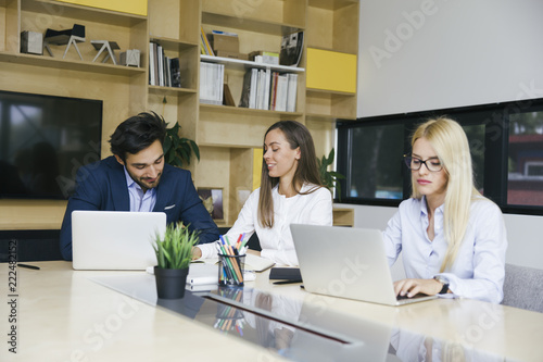 Young business people worki...