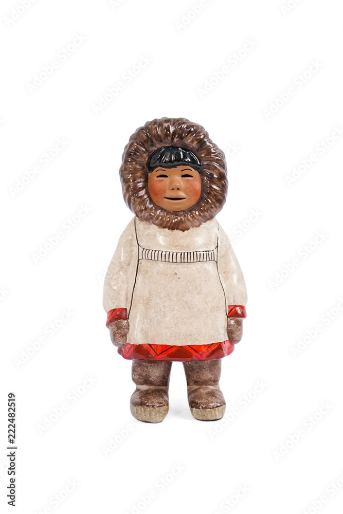 Eskimos. A common souvenir from Alaska a ceramic miniature of the