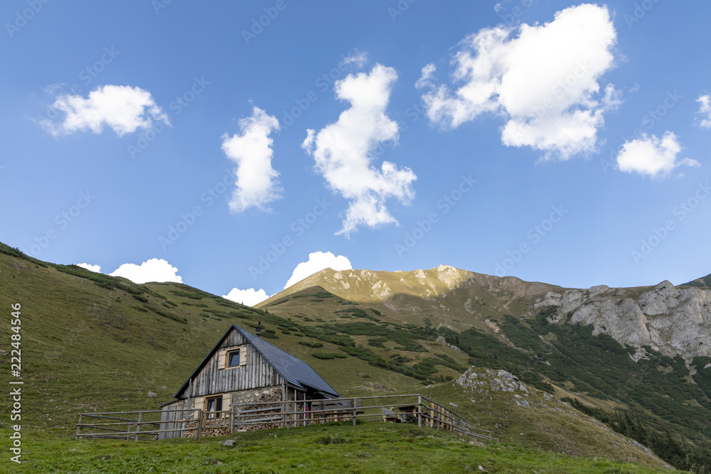 alpine hut krumpenalm beneath Eisenerzer Reichenstein, a mountain in the Ennstal Alps in the Austrian federal state of Styria