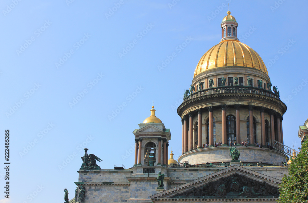 Saint Isaac's Cathedral Facade, Colonnade, Dome and Columns Close Up View. Old Neoclassical Church Architecture Building, Close Up of Saint Isaac Cathedral Fronton and Golden Dome on Empty Blue Sky