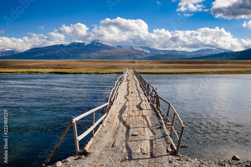 Wooden bridge in Altai Mountains Mongolia photo