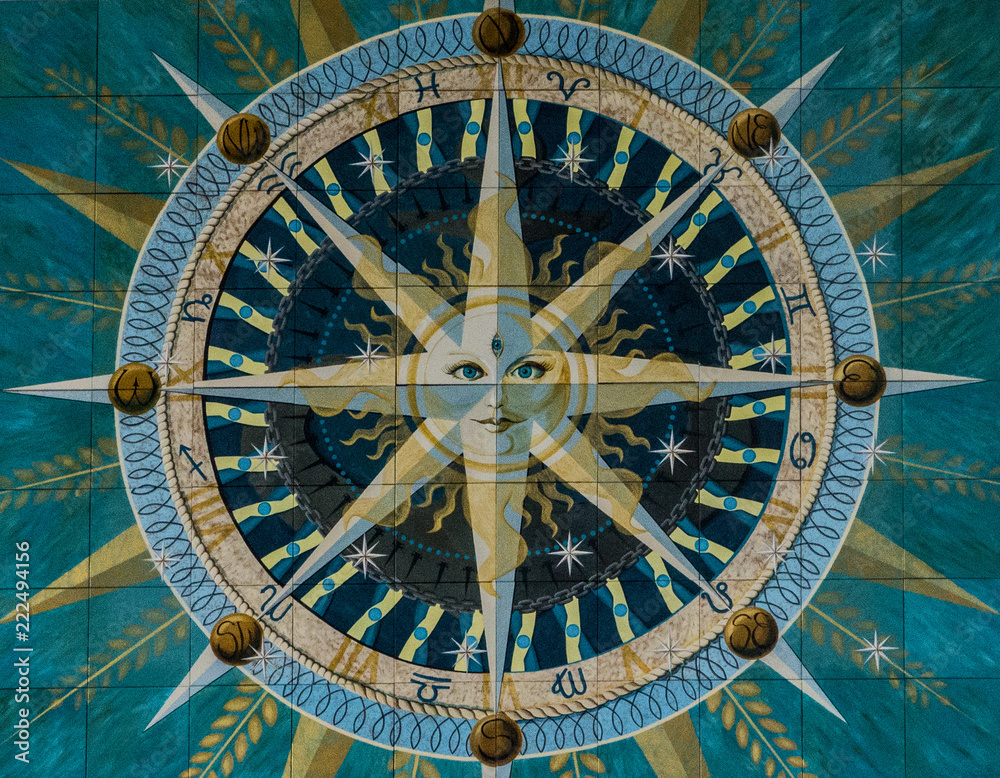 Decorative sun symbol background in Odessa port building, Ukraine. 