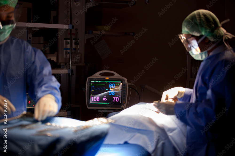 Heart monitor measuring vital signs. heart rate monitor in hospital theater Heart monitor measuring vital signs. heart rate monitor in hospital theater