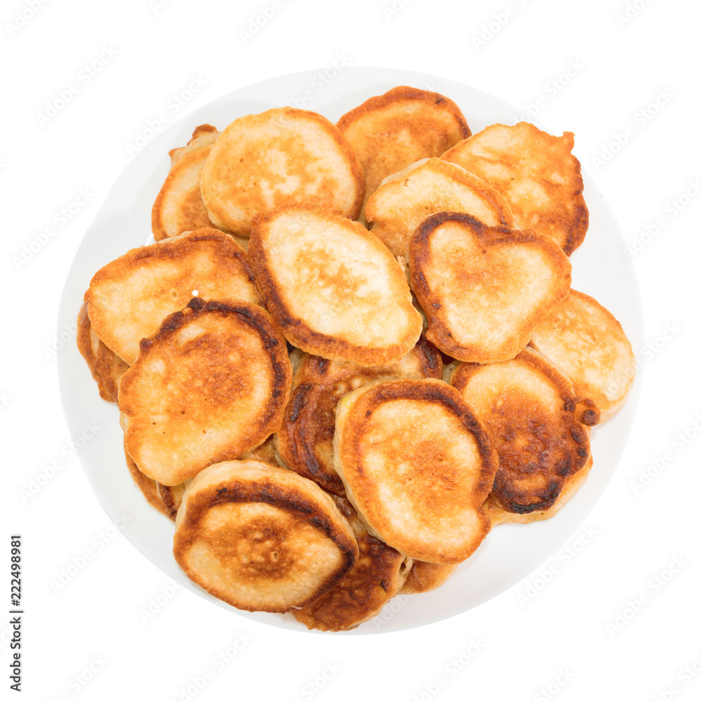 Sweet toasted pancakes on white plate and isolated white background