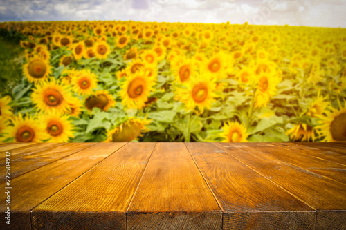beautiful sunflowers and an old wooden table 