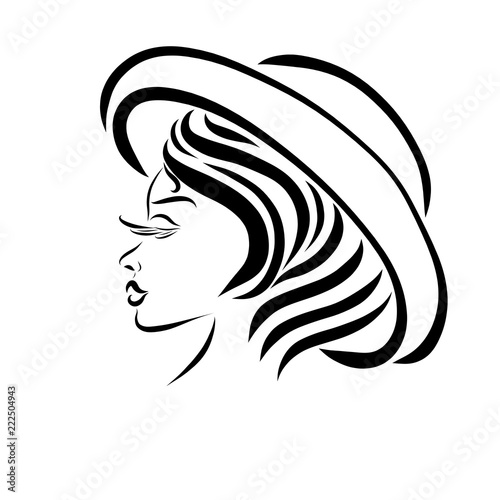 Stylish young lady in a hat, profile
