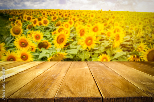 beautiful sunflowers and an old wooden table 