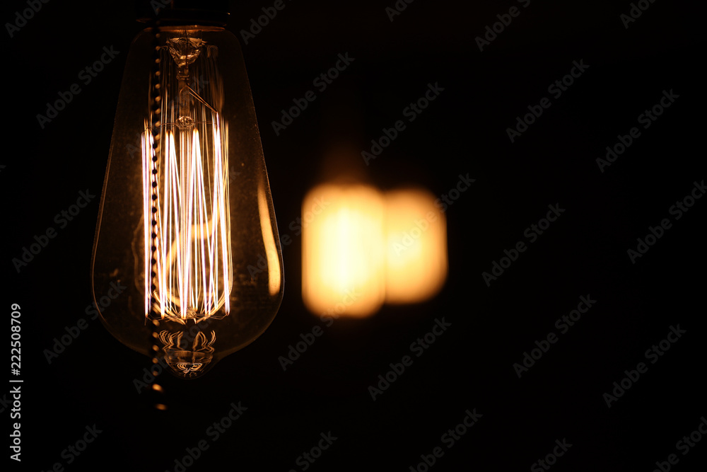Lamps with tungsten filament. Edison's light bulb. Filament fila