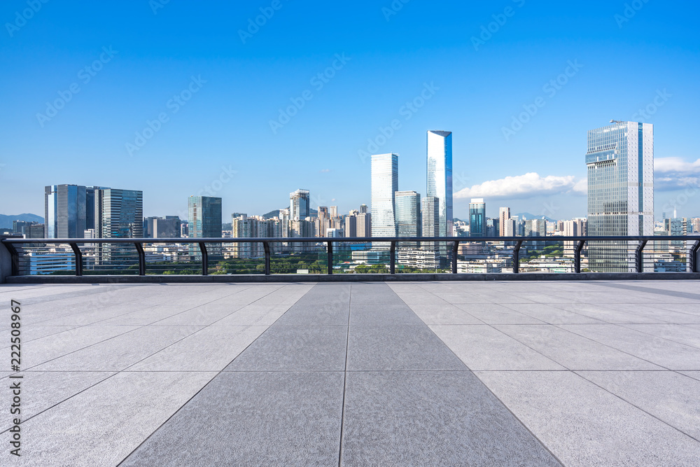 empty square with city skyline empty square with city skyline
