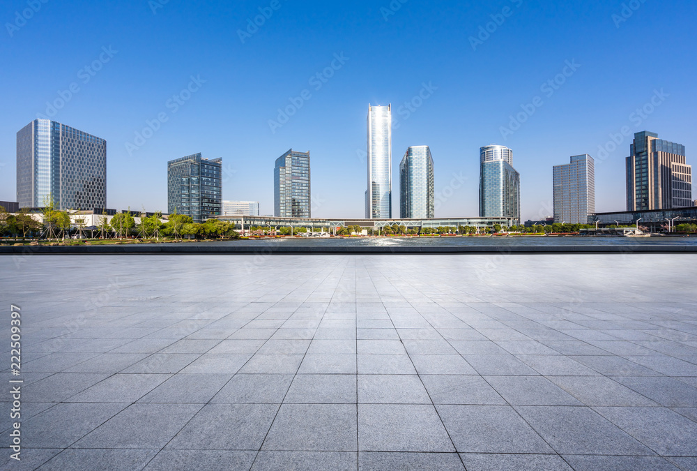 empty square with city skyline empty square with city skyline