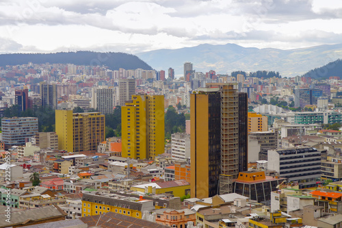 Cityscape panoramic aerial view from the Basilica Church viewpoint of Quito city, Ecuador