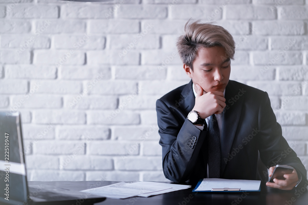 Young Asian businessman in white shirt and tie Young Asian businessman in white shirt and tie